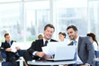 © ASDF - business partners discuss financial issues sitting in the lobby of the Bank