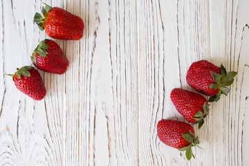 fresh strawberry on white wooden table, copy space