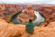 © nikolas_jkd - Travel in Horseshoe bend canyon, man Hiker enjoying view, Arizona, USA