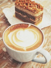 Wall Mural - Latte art coffee with cake