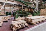Fototapeta  - Stack of pile wood bar in lumber yard factory used in wood-processing industry