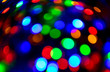 © konoplizkaya - Bright festive background. Shining colorful light bulbs