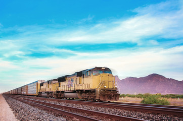 Freight train crossing US Arizona desert.