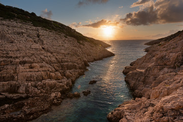 Wall Mural - Landscape view of rocky formations Korakonisi in Zakynthos, Greece.Beautiful summer sunset, magnificent seascape.