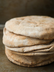 Canvas Print - stack of rustic pita bread