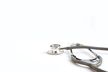 Gray stethoscope isolated on white background.