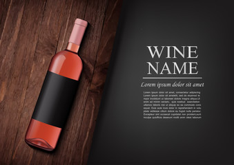 Advertising banner.A realistic bottle of pink wine with black label in photorealistic style on wooden dark board,black background like chalk board,text.Wine presentation brochure.Vector illustration