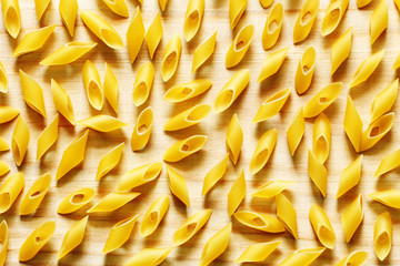 Pasta on a wood background closeup