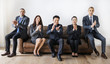© Rawpixel.com - Business people sitting together on couch