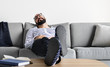 © Rawpixel.com - Man sleeping on the couch