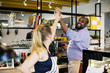 © Rawpixel.com - Colleagues give a high five to each other