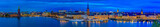 Fototapeta Psy - Panoramic sunset view onto Stockholm old town Gamla Stan and Riddarholmen church in Sweden