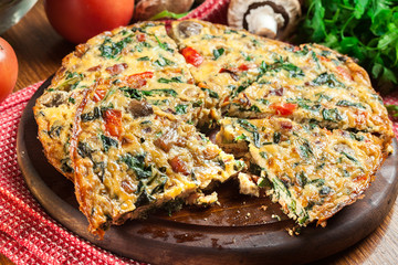 Wall Mural - Frittata made of eggs, mushrooms and spinach