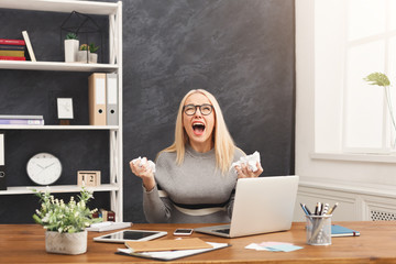 Wall Mural - Furious business woman shouting at work place