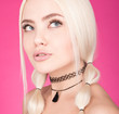 The choker on the neck. Closeup beauty portrait of young beautiful woman with white hair
