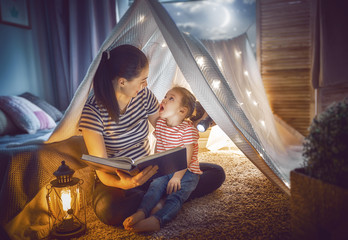 Mom and child reading a book