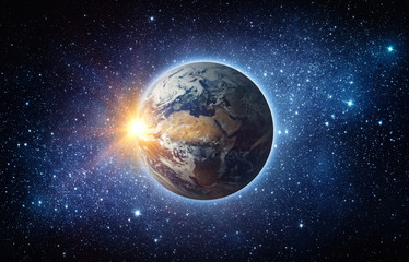 Wall Mural - earth, sun, star and galaxy. sunrise over planet earth, view from space. elements of this image furn