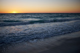 Fototapeta Nowy Jork - Sunset over a sandy beach on Anna Maria island