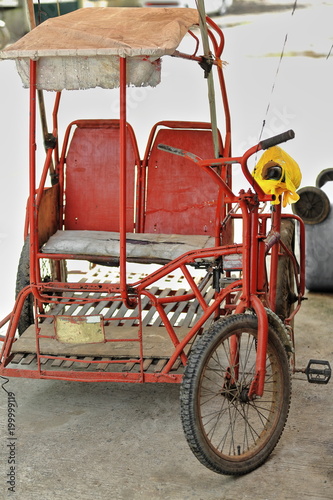 Red Painted Tricycle In The City Public Market Area Sipalay