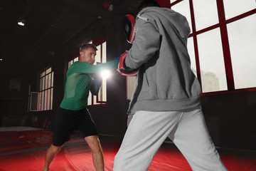 Sticker - Young professional boxers training in gym