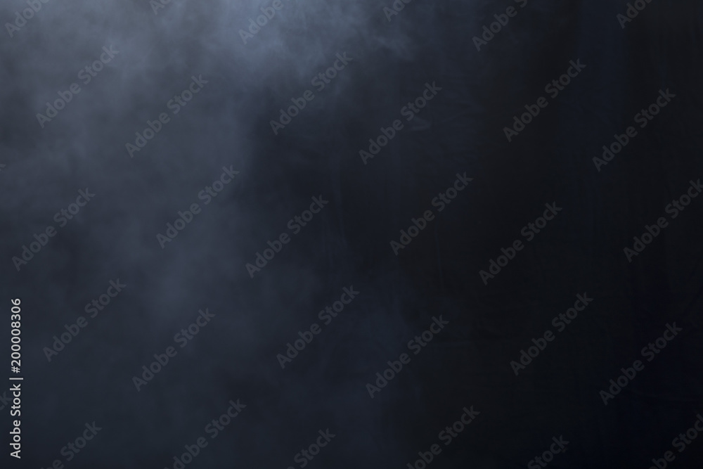 Fog/haze covers left side of screen over a black background - obrazy, fototapety, plakaty 
