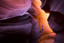 The Meandering Walls Of The Underground Labyrinth Of Colored Sand Of The Lower Antelope Canyon In Page Arizona Create Unique Combinations Of Light Shadows And Colors