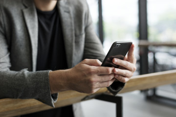 man using his mobile phone