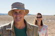 © Wavebreak Media - Portrait of smiling man with woman on landscape