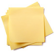 Untidy stack pile several square yellow sticky post it note isolated on white background photo
