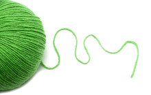 Green Yarn Ball On White Background