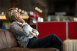 © Wavebreak Media - Businesswoman talking on mobile phone in waiting area