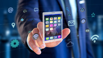 Poster - Businessman holding a tablet surrounding by app and social icon - 3d render