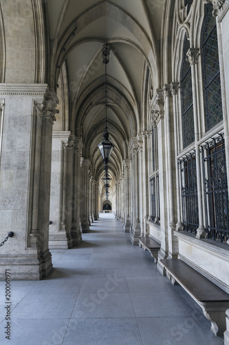 A Beautiful Arcade With Vaulted Ceilings Iron Lanterns And Stone