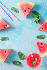 Wall Mural - Watermelon smoothie with slice of fruit and leaf of mint