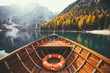 © JFL Photography - Traditional rowing boat on a lake in the Alps in fall