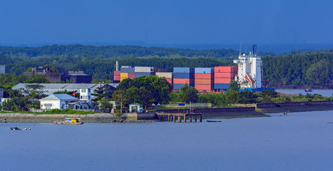 Poster - Container vessel sails upstream the Long Tau River.