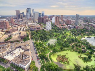 Minneapolis, Minnesota Skyline seen from above by Drone in Spring