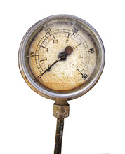 Old Rusty Round Industrial Pressure Gauge With Numbers Round The Dial Mounted On A Metal Surface Of A Large Abandoned Diesel Powered Generator