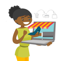 Canvas Print - Young african-american woman doing online shopping. Happy woman making order of shoe through a laptop in virtual shop. Online shopping concept. Vector cartoon illustration isolated on white background