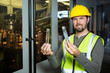 © Wavebreak Media - Male worker examining juice in test tube at factory