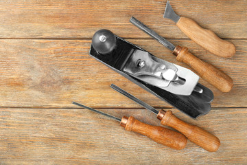 Sticker - Set of carpenter's tools on wooden background