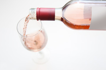 Rose wine, white background