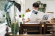 © Rawpixel.com - Young man reading newspaper in the morning
