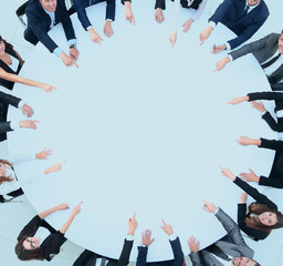 group of business people sitting at the round table. the busines