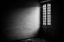 Light From A Window In An Abandoned Building - Black And White Image