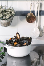 Pot With Mussels On Kitchen