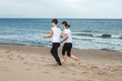 © Rafa - Girls running around the beach