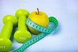 © Elena Blokhina - Apple,dumbbells and measuring tape