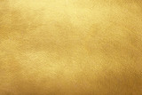 Fototapeta  - Gold background. Rough golden texture. Luxurious gold paper template for text design, lettering.