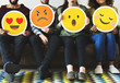 © Rawpixel.com - Group of diverse people holding emoticon icons